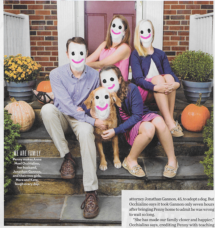 A family with happy faces drawn overtop of their conforming faces.